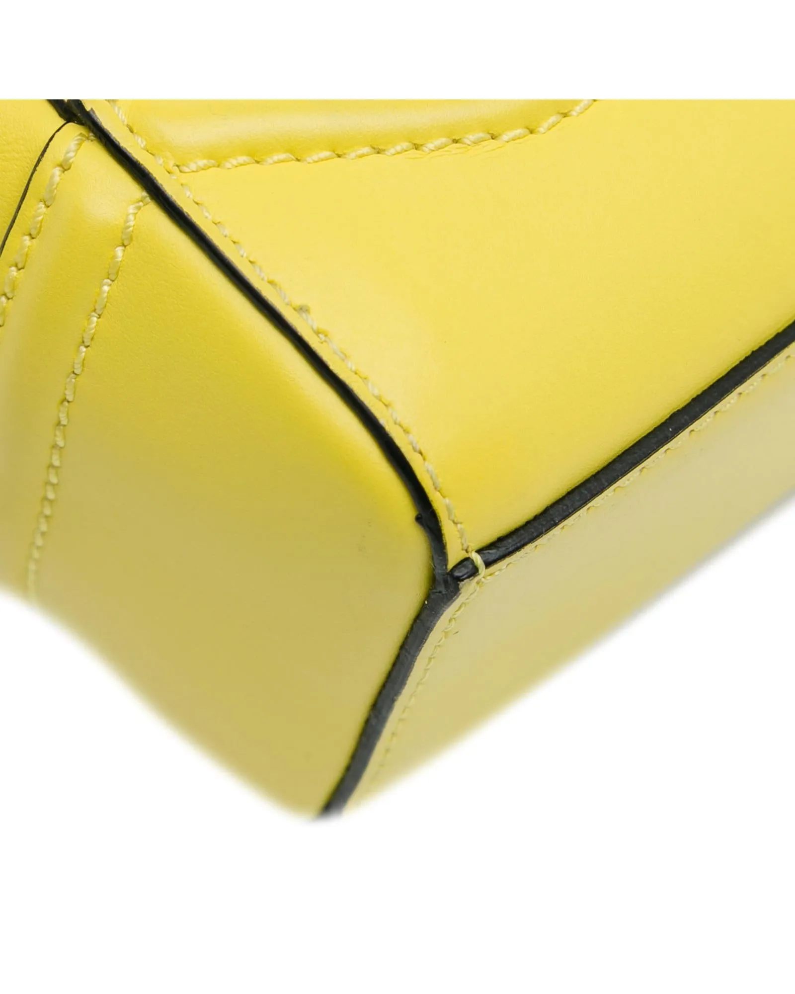 Elegant Calfskin Handbag with Rolled Handles and Detachable Shoulder Strap