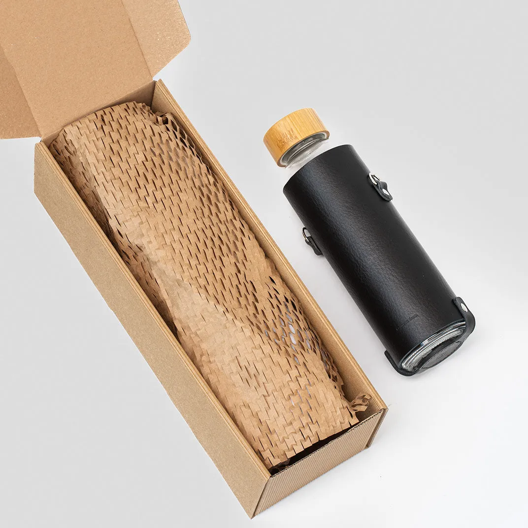 Leather water bottle holder with strap and glass bottle