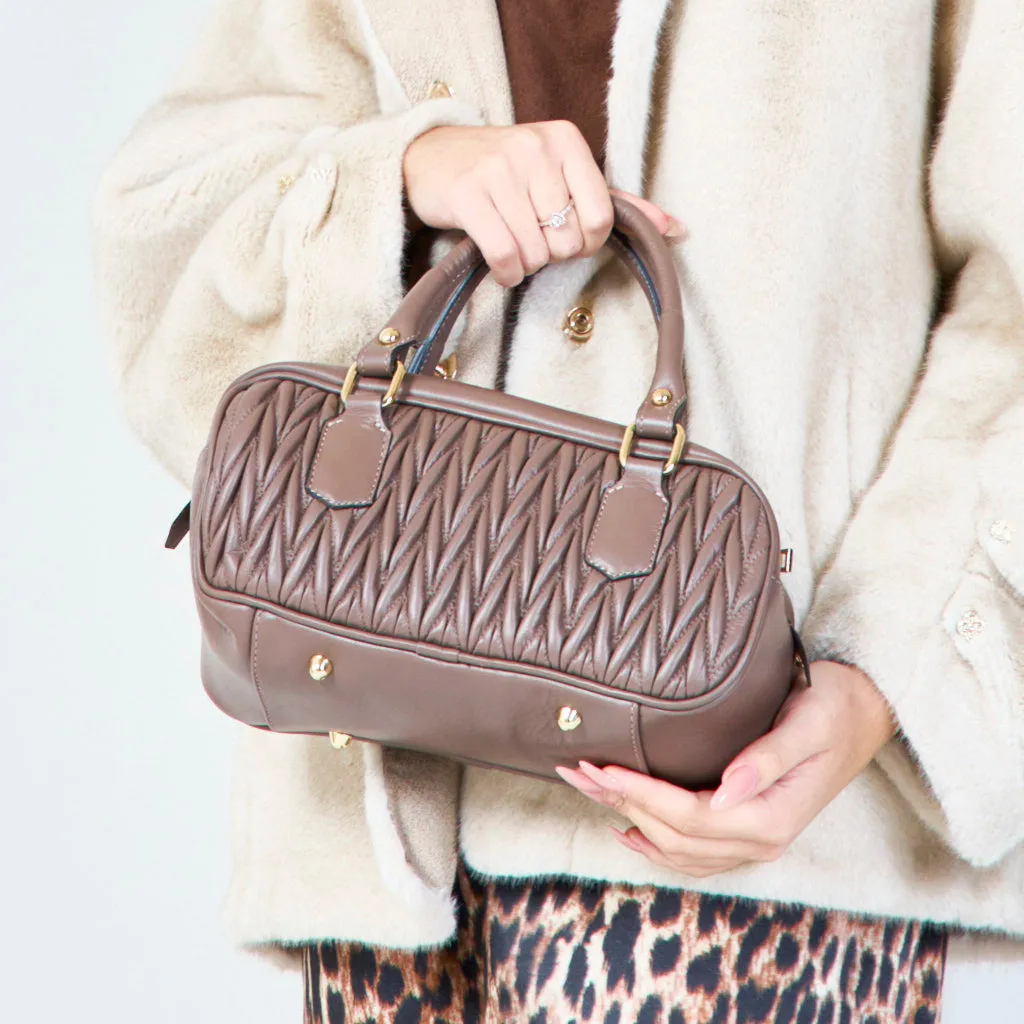 Quilted and smooth barrel handbags wholesale