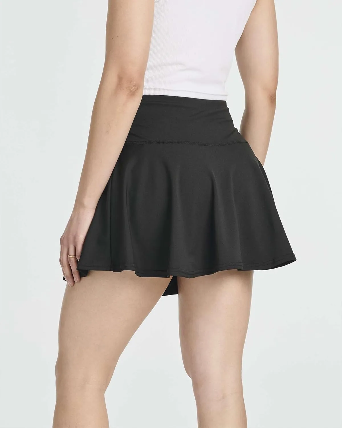 Real Essentials 4 Pack: Women's High Waisted Tennis Skirts Skater Skort Tummy Control Golf Shorts Pockets (Available in Plus)